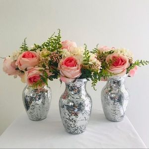 Set of 3 mercury glass vases w/ silk flowers.